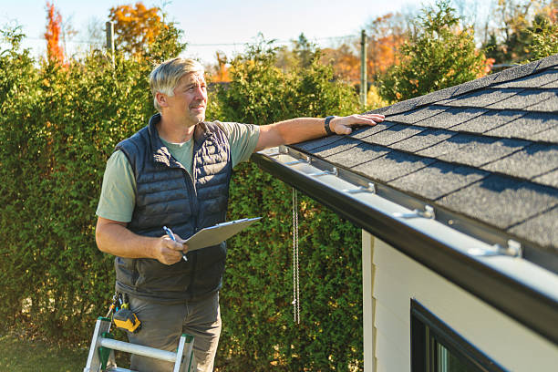 Professional Hail Damage Roof Repair technician working in Bee Spring, KY